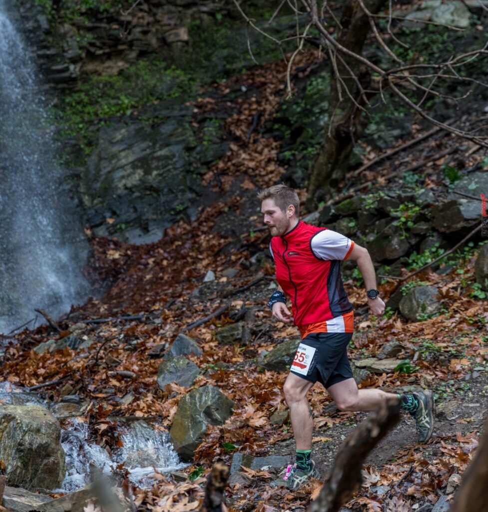 Kristjan Oro trail running in the mountains